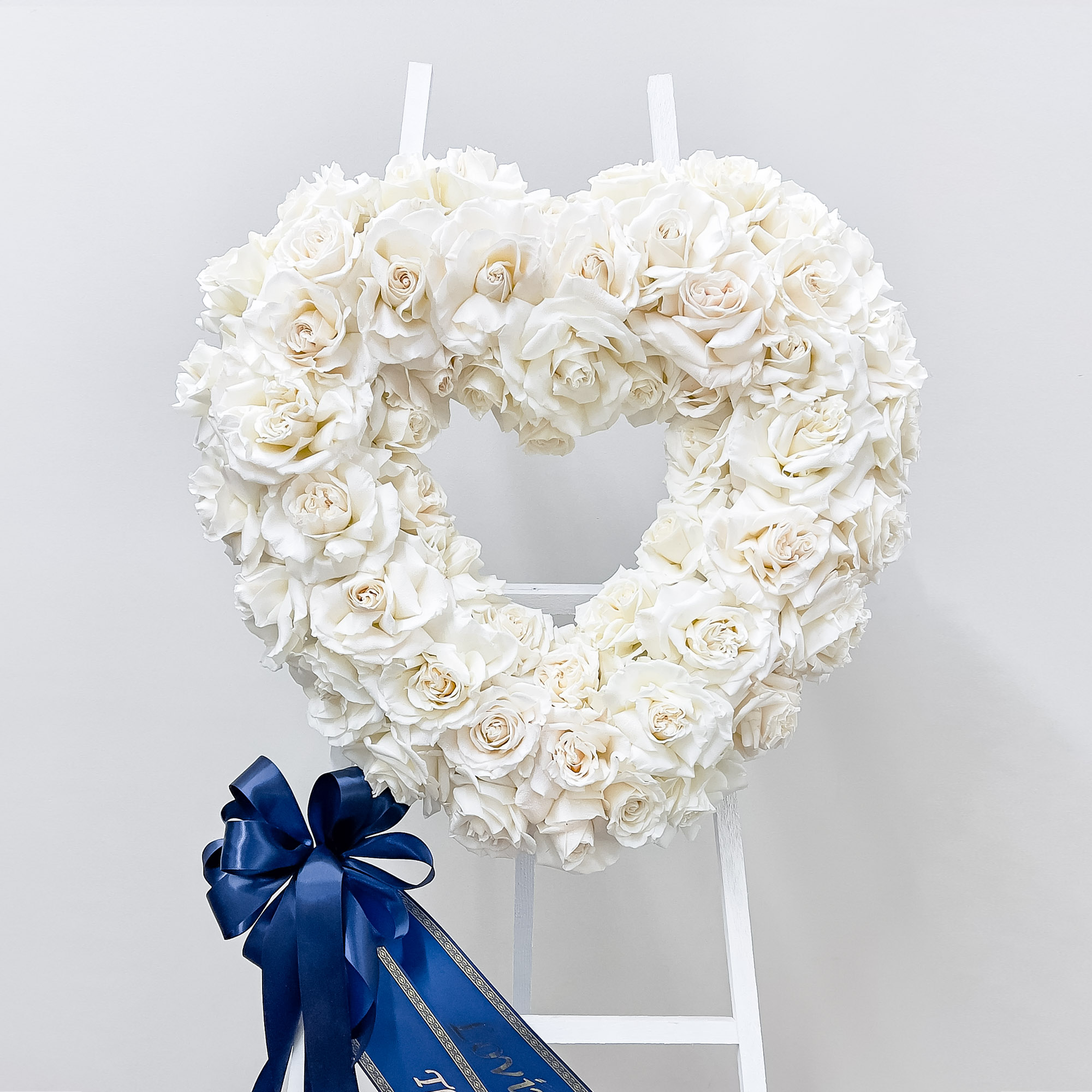 All The Bright Colors Heart Shaped Tribute Wreath